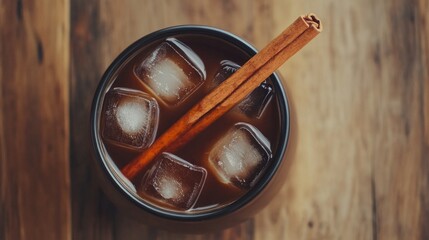 Minimalist Cold Brew Coffee with Ice and Cinnamon Stick in Glass