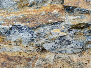 Natural  gray brown rough grainy stone texture background, backdrop 