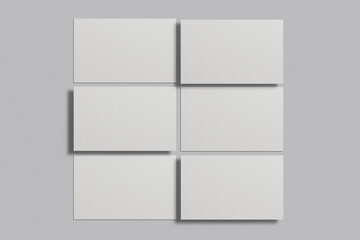 Blank business card mockup on a grey background. 85x55 mm. 