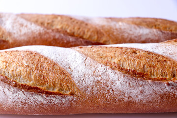 Close-up of a baguette bread. Texture of the bread. Macro shot.