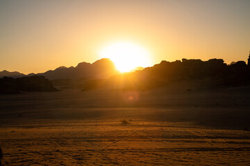 Naklejka premium Panoramic view of rock formation during sunset at Wadi Rum, Jordan