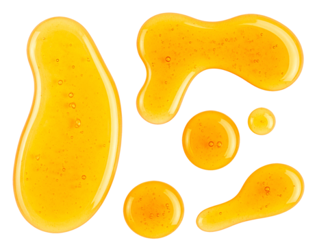 realistic honey drops and syrup blobs in various organic shapes and golden textures on isolated background
