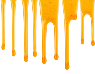 top view of vertical dripping lines of honey, parallel syrup trails on black
