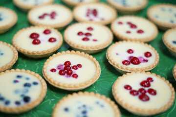 Small tartlets with fruit. Close up. 