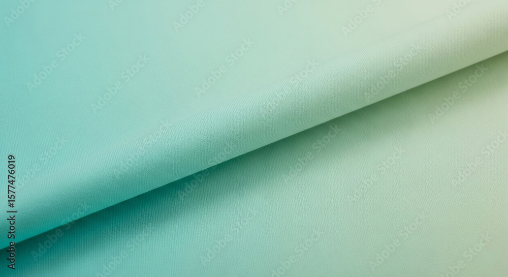 Poster Elegant mint fabric texture displays a soft gradient creating a clean minimalistic textile background.