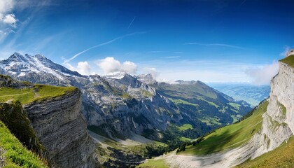 panoramic view of rock wall at horizon in swiss alps