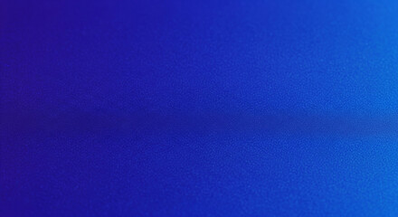 Deep blue surface shows a grainy, textured backdrop with light variation and an underwater feel