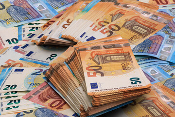 Euro banknotes close up as background