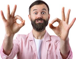 Portrait of a smiling young man in a pink jacket. Man showing ok gesture while standing in studio over isolated background.