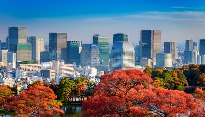 view of contrasting city skyline and japanese red pine trees near the imperial palace of tokyo tokyo honshu japan