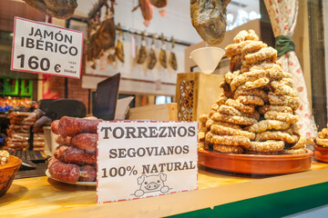Segovia, Spain - 3 March, 2025: Torreznos, a delicious fried pork belly snack, on sale at a butchers shop in Segovia