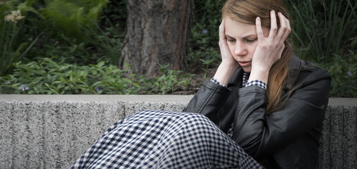 Sad girl in the park