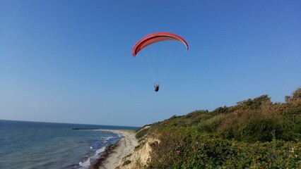 paraglider over the sea
