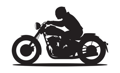 Silhouette of a person riding a motorcycle with a helmet