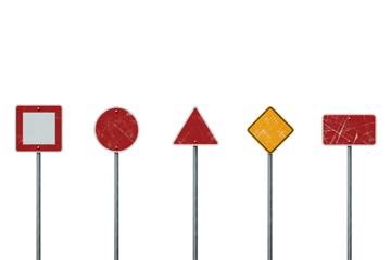 Various weathered road signs stand isolated against a transparent background