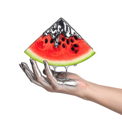 Silver hand holding watermelon slice against black background