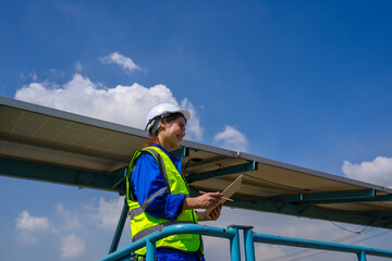 Engineers are working at solar farm.