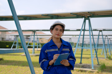 Engineers are working at solar farm.