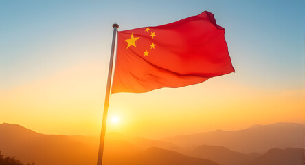 Chinese Flag Waving at Sunrise on background. 