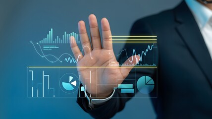 Man interacting with holographic financial graphs represents advanced technology trends and data analysis for business success.
