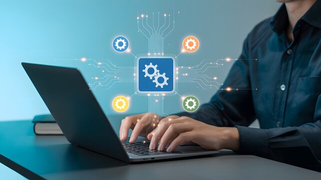 Businessman works on laptop to automate tasks with modern cloud-based software and workflow technology system.