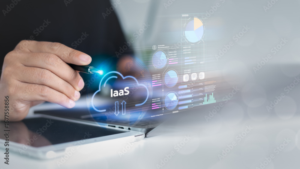 Poster close-up of a hand pointing to an iaas cloud icon on a laptop with a data analytics dashboard, repre