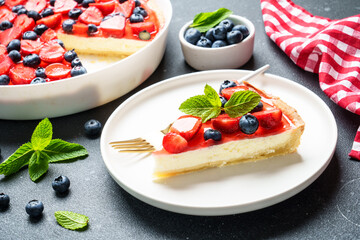Tart with strawberry and blueberry and cream cheese. Homemade baking.