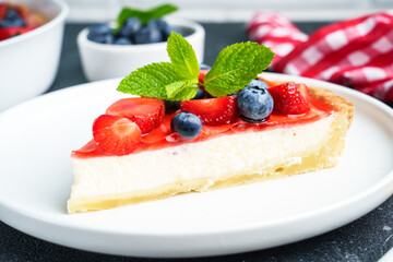 Tart with strawberry and blueberry and cream cheese. Homemade baking.