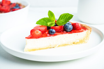 Tart with strawberry and blueberry and cream cheese. Homemade baking.