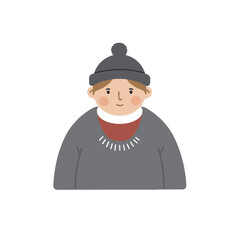 Young boy wearing a hat and sweater with a friendly expression  