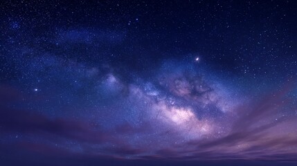 Obraz premium a breathtaking view of a starry night sky, Milky Way visible, glowing stars, serene atmosphere, deep blue and purple tones