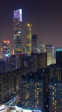 guangzhou city downtown traffic street night illumination aerial timelapse vertical panorama 4k china