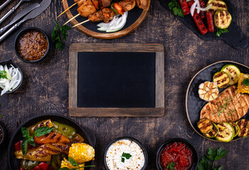 Assortment of grilled bbq meat and vegetables