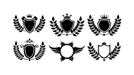 Obraz premium Vintage heraldic shield vector set with crown and laurel wreath design element