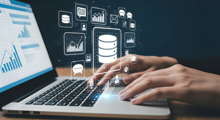Relational database RDB and data model. Database management system DBMS technology. Businessman typing on laptop computer keyboard at desk in office.