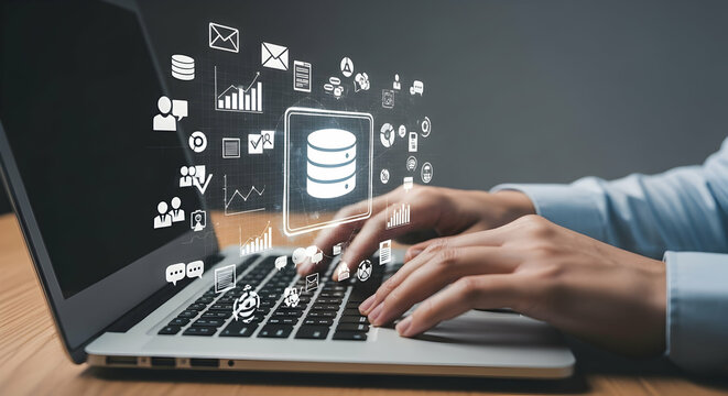 Relational database RDB and data model. Database management system DBMS technology. Businessman typing on laptop computer keyboard at desk in office.