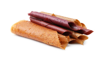 Delicious fruit leather rolls isolated on white
