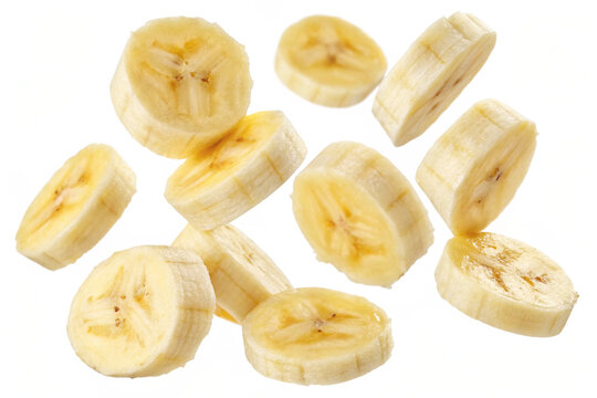 A refreshing food visual of sliced bananas floating against a pure white background.