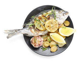 Tasty roasted dorado fish with potatoes, rosemary and lemon isolated on white, top view. Homemade...