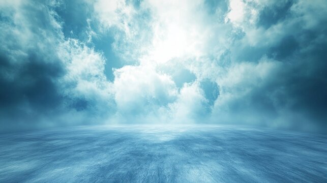 A vast, open, and empty concrete floor with a blue sky and white clouds in the background.
