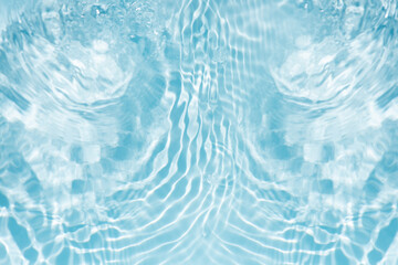 Blue water with ripples on the surface. Defocus blurred transparent blue colored clear calm water...