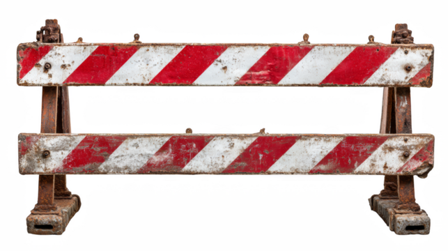 Rusty construction barrier against a dark backdrop showcases industrial decay and hazard warning.