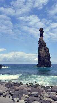 Majestic coastal landscape with Ilheus da Ribeira da Janela rock formations, ideal for travel destinations, mindfulness visuals, relaxation themes, and nature inspiration. Vertical video