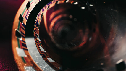 An old twisted color film lies on a dark background, symbolizing memories on the film. The film...