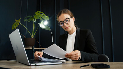 An accountant or economist who works late at the office. Ideal for topics related to finance, night...