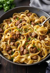 Gourmet pasta dish with savory beef stew, garnished with herbs.