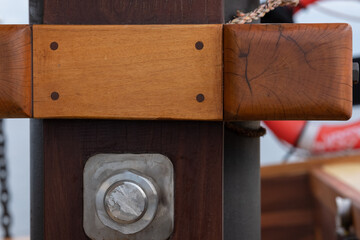 The legacy of Pinisi boat building. Detailed shot of the traditional woodworking techniques used to...