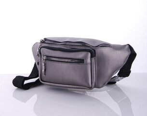 Stylish gray waist bag designed for convenience and fashion with multiple pockets for easy storage