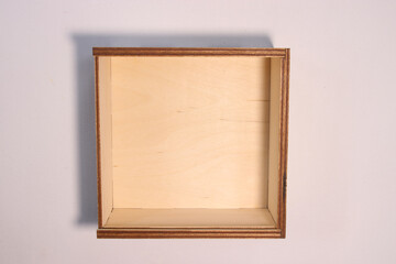 Wooden display box on a neutral background ready for storage or decoration in a modern home...