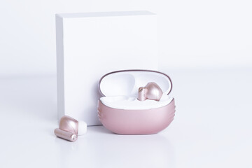 Stylish wireless earbuds in a sleek charging case showcased on a white background